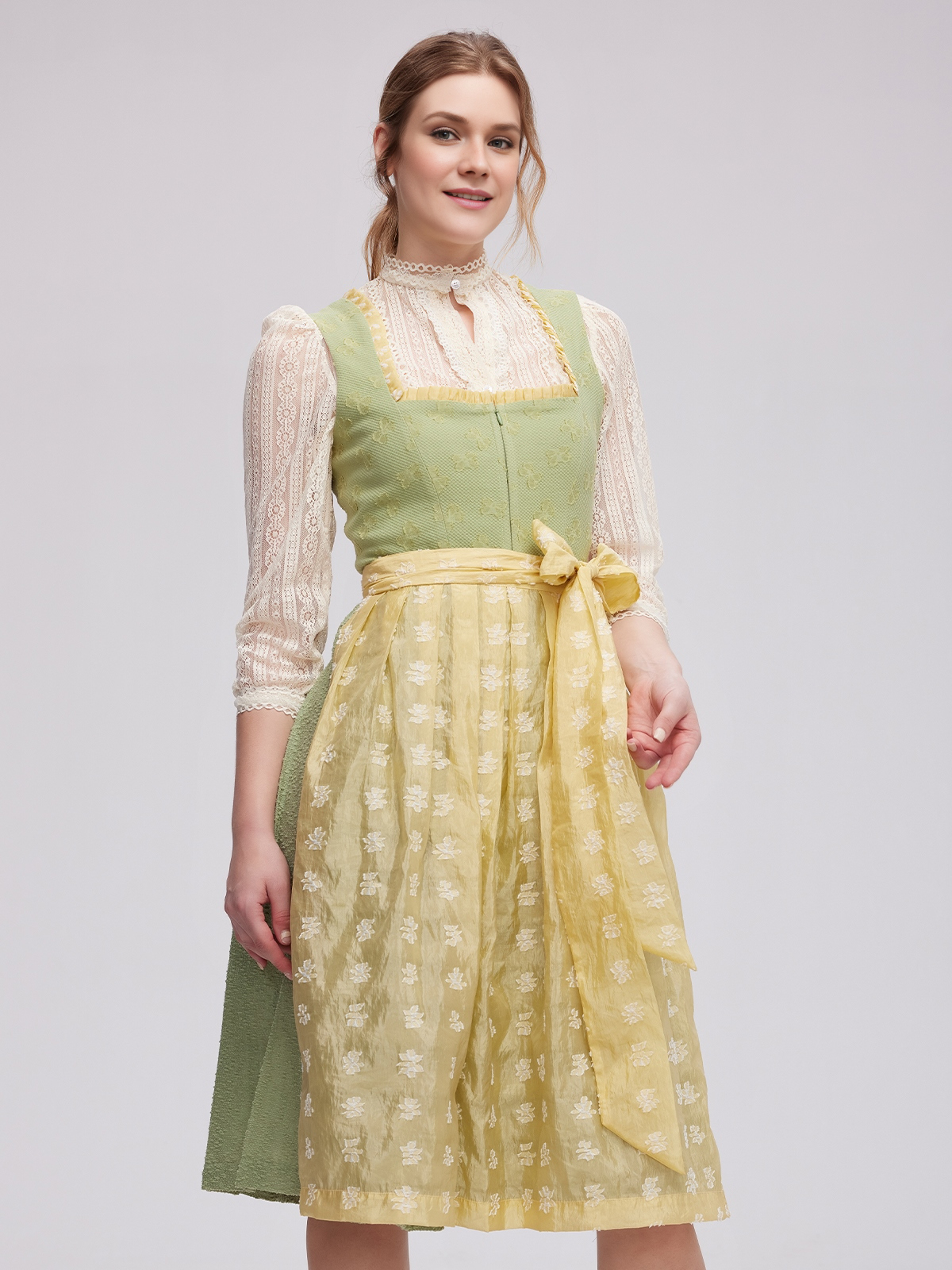 Elegantes grünes Dirndl mit floralen Details