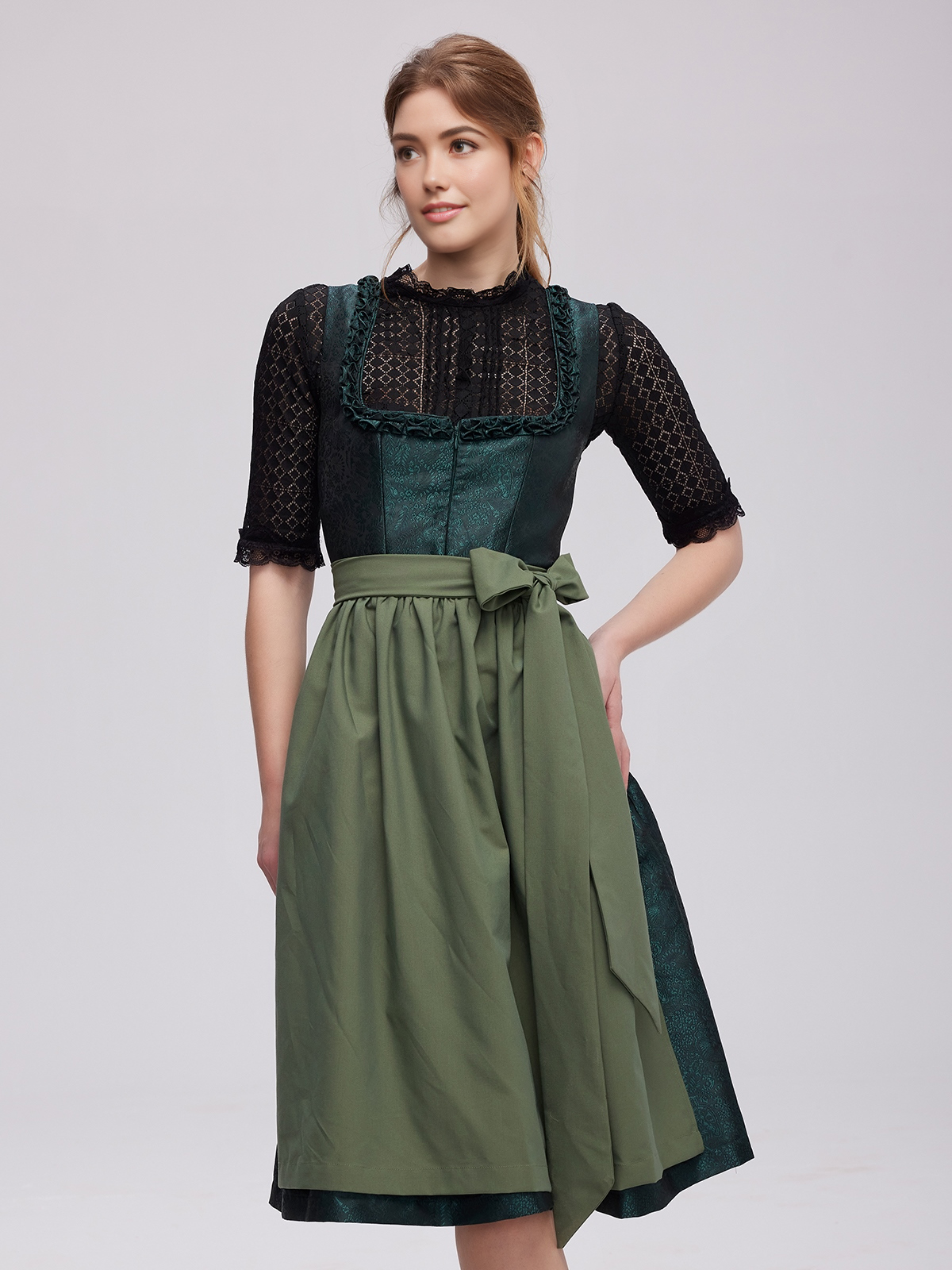 Schwarz rotes Dirndl mit grünen Akzenten